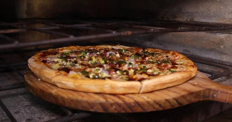 Зейнетақы ақшасы неге пицца жасайтын Domino’s қа салынды? Сарапшылар жауабы