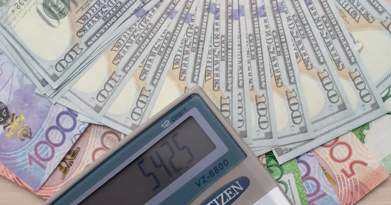 Курс доллара вырос к тенге на бирже перед выходными