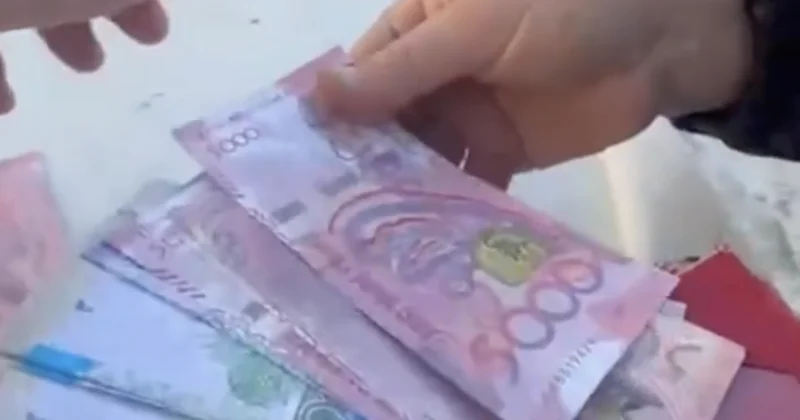 Женщина рассчитывалась на рынке фальшивыми купюрами тенге в Актобе (ВИДЕО)