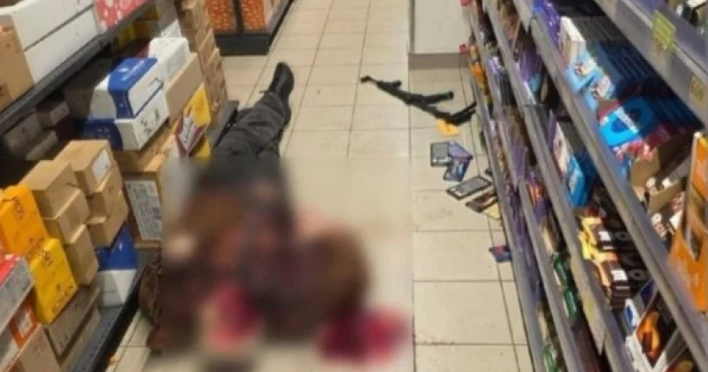 Киевте ер адам көшеде оқ жаудырып, адамдарды кепілге алды: 6 адам қаза тапты, 15 адам жараланды