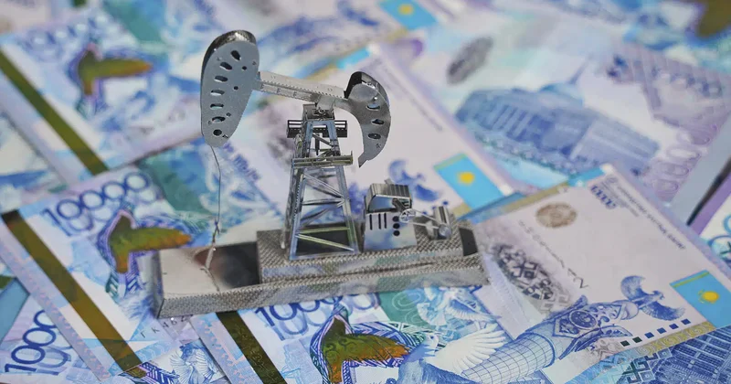 Kazakhstan pledges cautious revision of production sharing agreements with oil majors