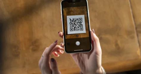 Сулейменов объяснил задержку единого QR кода у банков