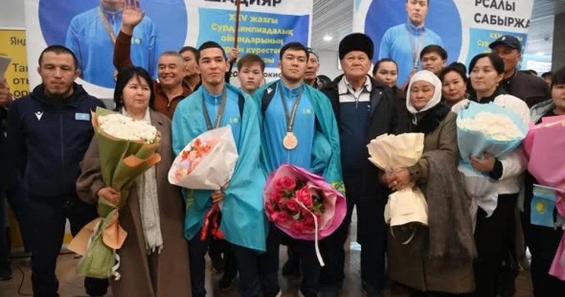 Трихи жеңіске жеткен палуандарды күтіп алу рәсімі өтті